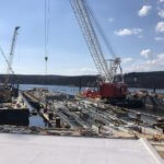 Construction work with cranes on Naval Base pier