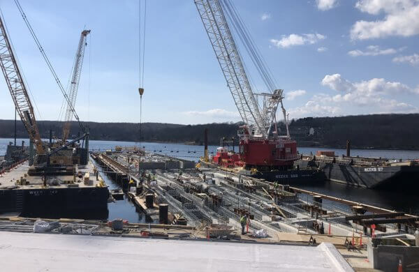 Construction work with cranes on Naval Base pier