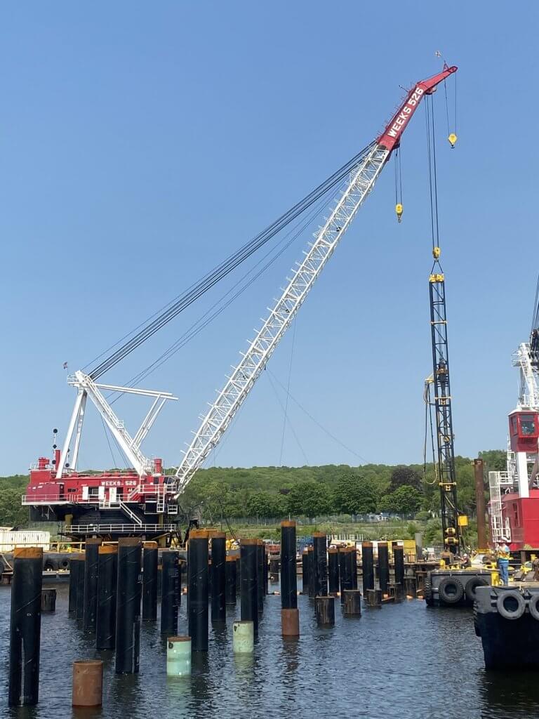 Large construction crane on Naval base pier